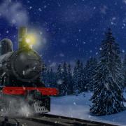 Christmas Train Traveling Through The Snow