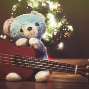 Christmas Teddy Bear Playing A Ukulele