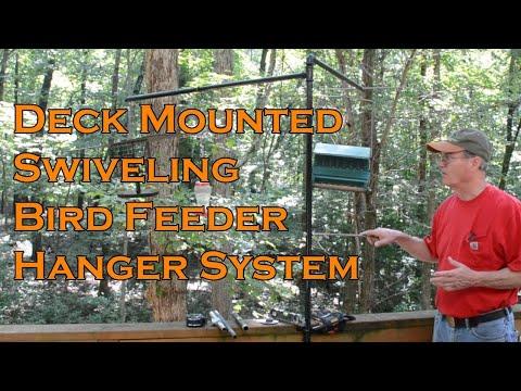 Do it yourself, easy to use pivoting bird feeder system for deck.